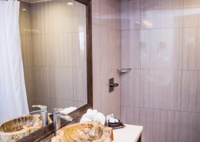 A walk in shower at a hotel room in Jaco Beach