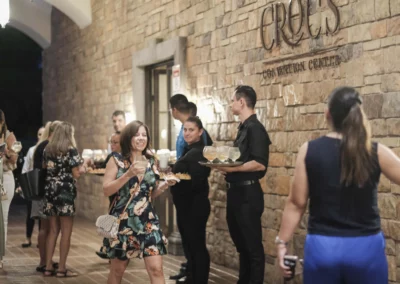 A group of people enjoying welcome cocktails