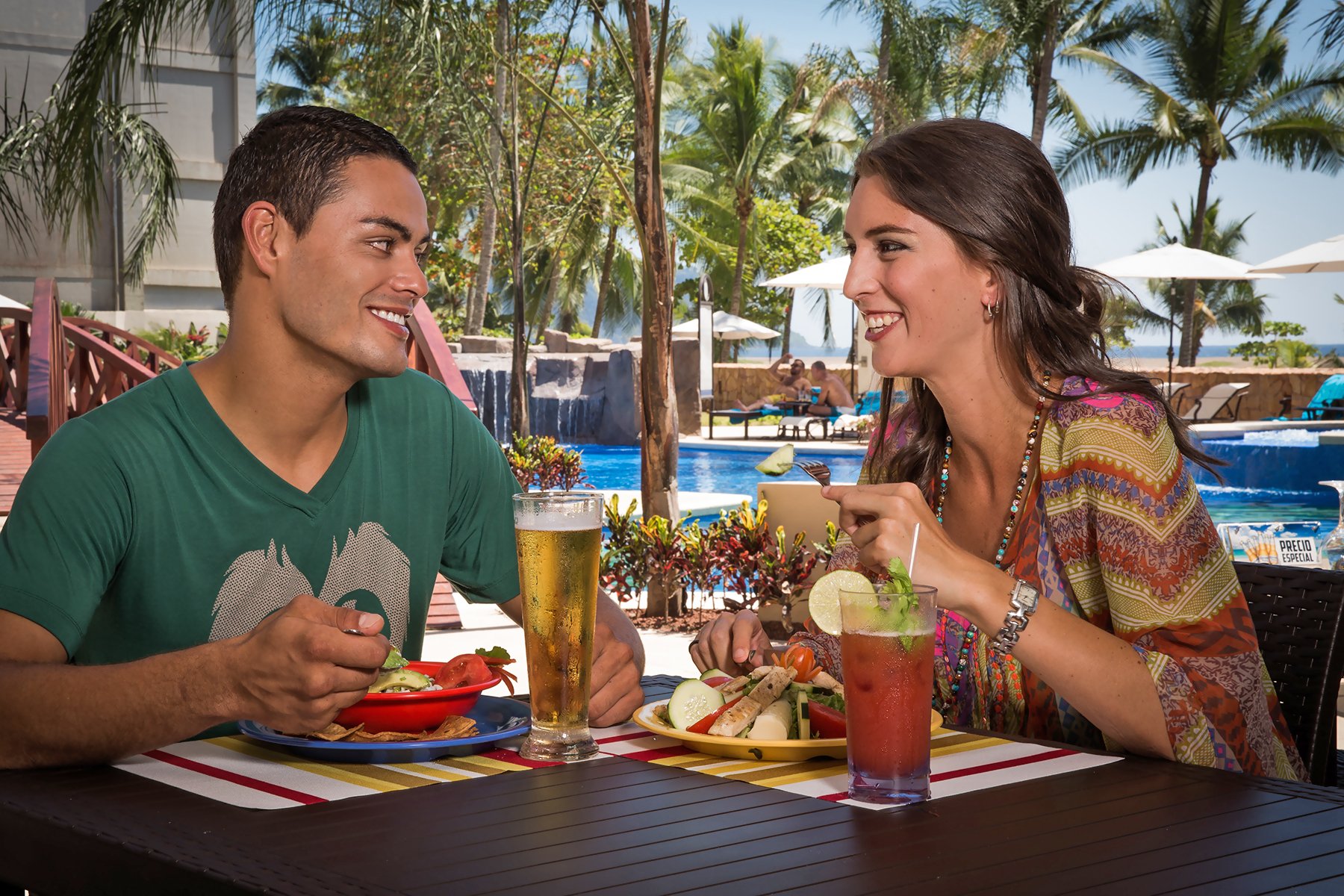 El Zarpe couple A couple enjoying lunch at the pool in Costa Rica
