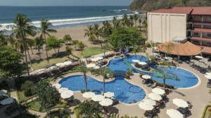 A resort pool area of Crocs in Jaco Beach